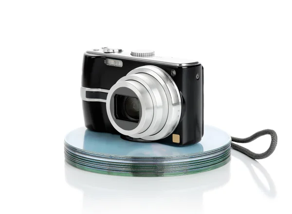 Kameran på en hög av diskar — Stockfoto