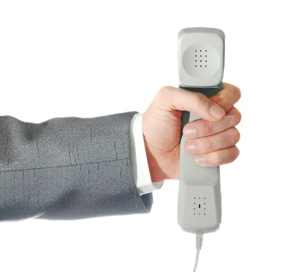 Telefon röret i en hand — Stockfoto