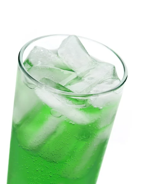 Green drink in a glass with the ice — Stock Photo, Image