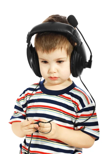 Het kind in hoofdtelefoon — Stockfoto