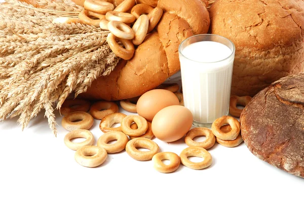 Wheat, bread, milk and eggs — Stock Photo, Image