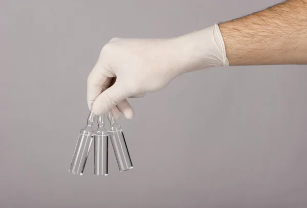 Bottle in a hand — Stock Photo, Image