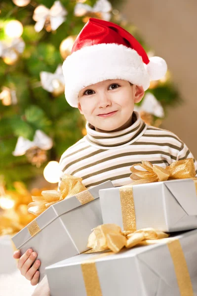 Child with gifts — Stock Photo, Image