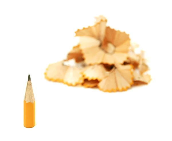 Sharpened pencil with chips — Stock Photo, Image