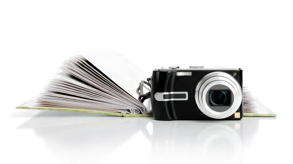 Camera and album — Stock Photo, Image