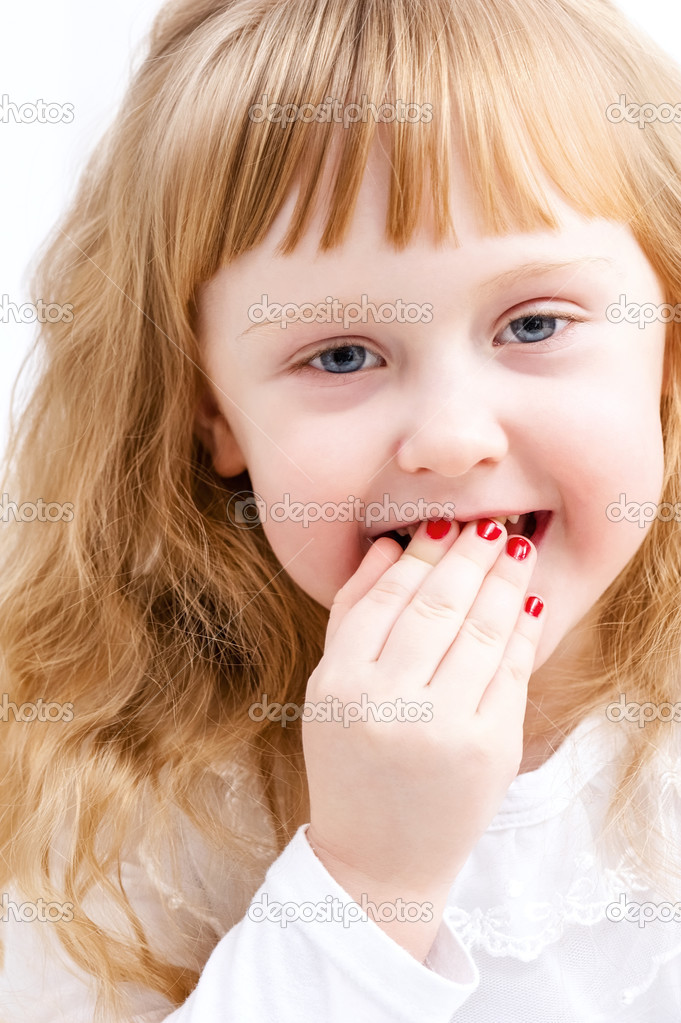 little girl with red nail polish on hand