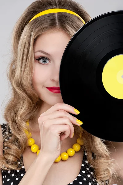 Young girl with vinyl record — Stock Photo, Image