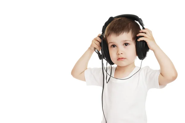 Criança em fones de ouvido — Fotografia de Stock