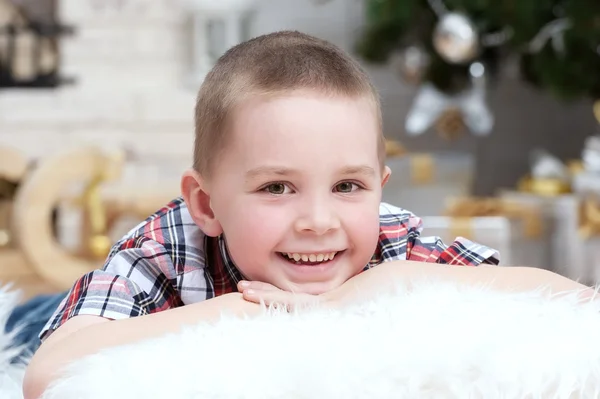 Little boy lies on a pillow — Stock Photo, Image