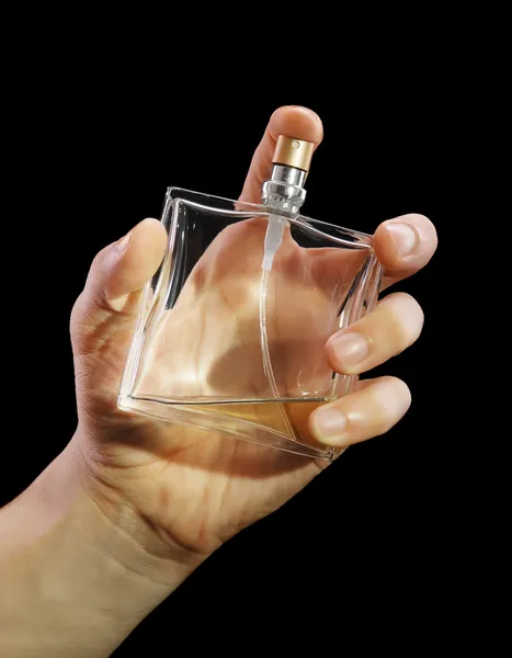 Perfume in hand — Stock Photo, Image