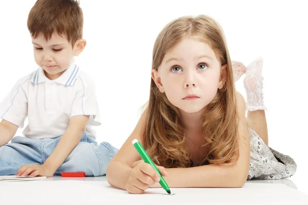 Little boy and girl draws — Stock Photo, Image