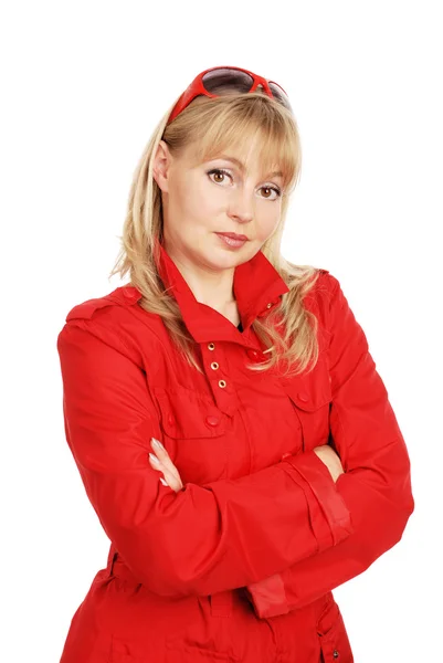 Woman in red coat  and solar glasses — Stock Photo, Image