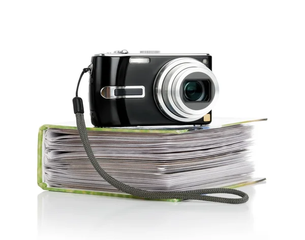 Camera and album — Stock Photo, Image
