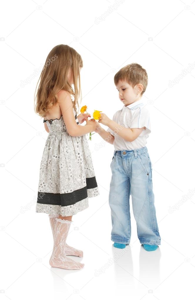 Boy and girl with flowers