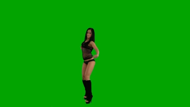 Chica joven bailando contra pantalla verde — Vídeos de Stock