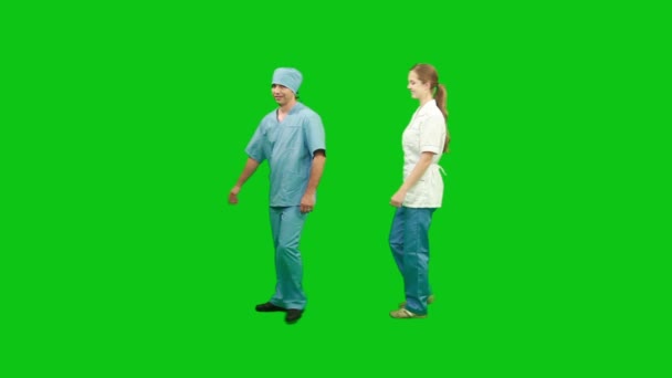 Doctors standing and smiling — Stock video