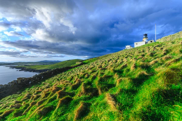 Old lighthouse on isolated island — Stock Photo, Image