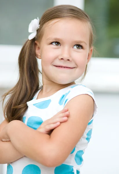Little girl is showing grimace — Stock Photo, Image