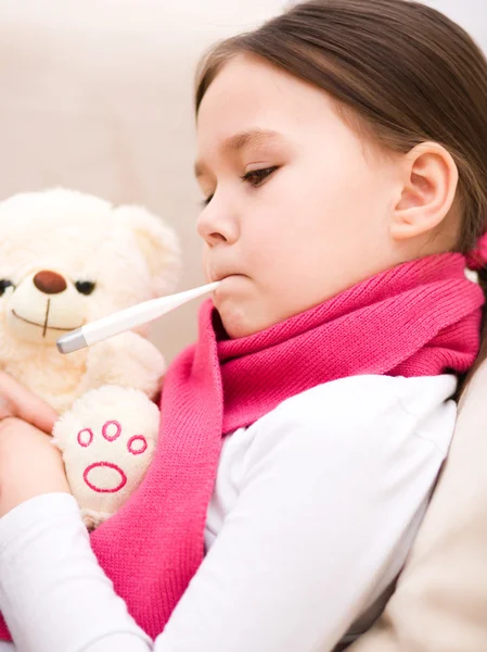 Little girl with thermometer in her mouth — Stock Photo, Image