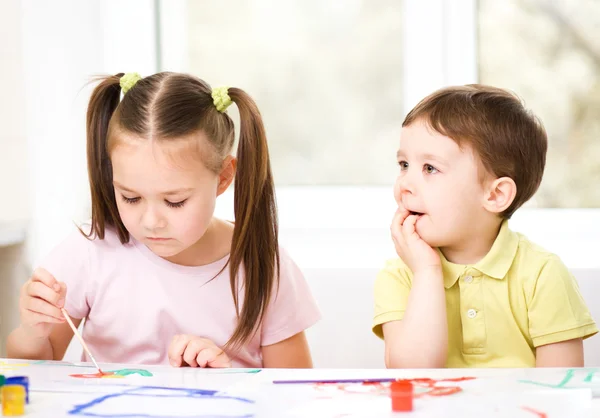 Children are painting with paint Stock Image