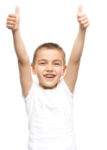 Happy boy is showing thumb up gesture — Stock Photo, Image