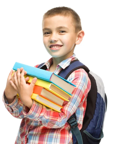 Söt pojke håller boken — Stockfoto