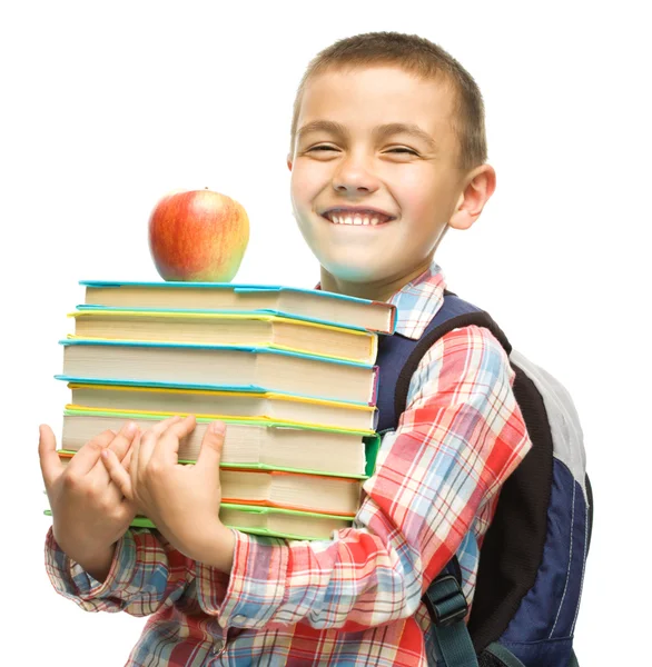 Cute boy is holding book — Stock Photo, Image