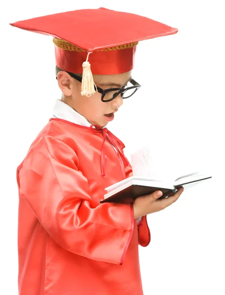 Cute boy is holding book — Stock Photo, Image