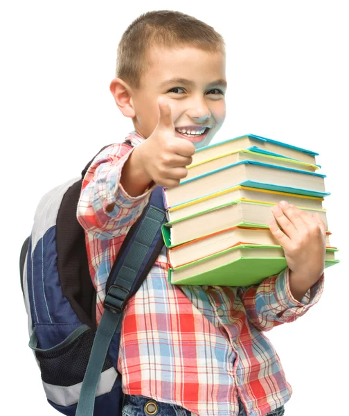 Ładny chłopiec trzyma książki — Zdjęcie stockowe