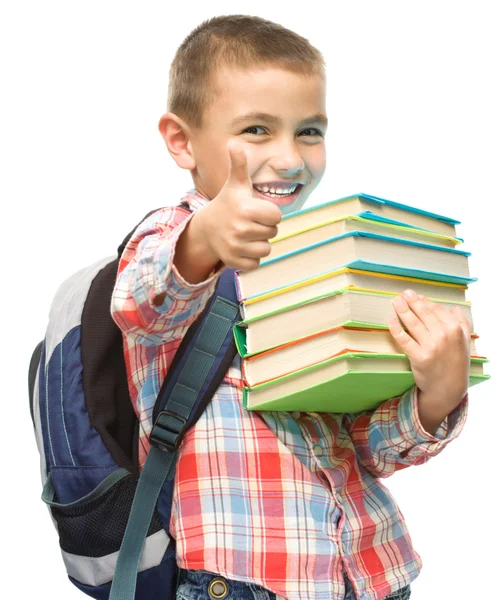 Rapaz bonito está segurando livro — Fotografia de Stock