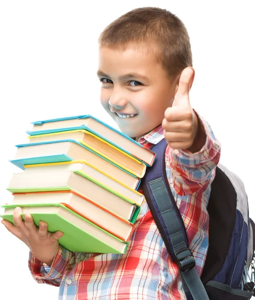 Rapaz bonito está segurando livro — Fotografia de Stock