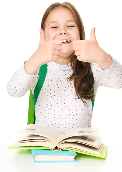 Cute girl is reading book — Stock Photo, Image