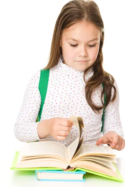 Cute girl is reading book — Stock Photo, Image