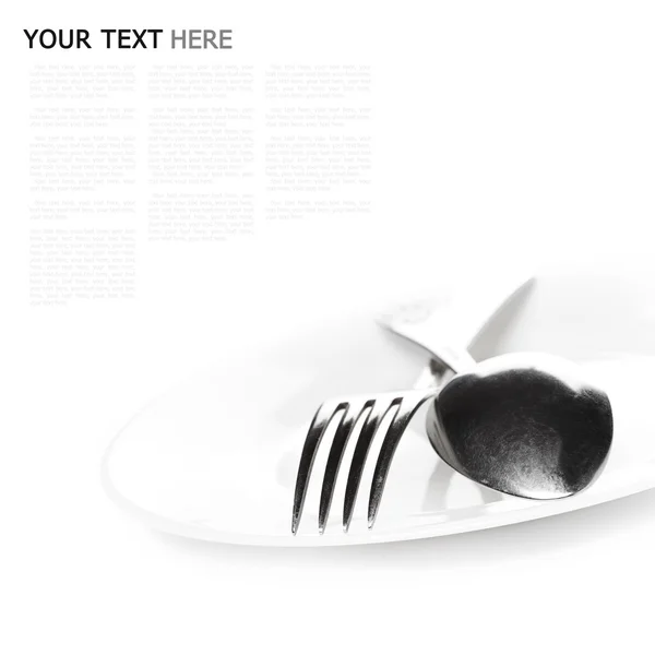 Close up of a silver spoon and fork on a white background (with — Stock Photo, Image