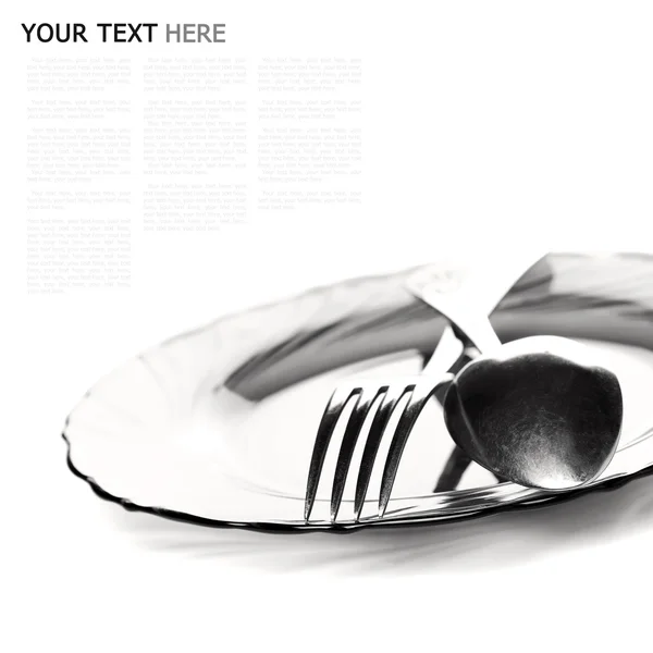 Close up of a silver spoon and fork on a white background (with — Stock Photo, Image