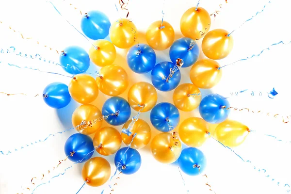 Colourful balloons with golden and blue streamers isolated on wh — Stock Photo, Image