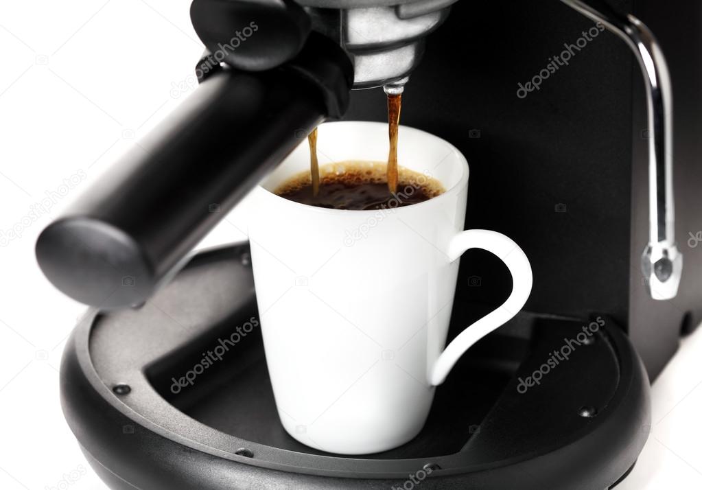 Coffee maker pouring hot coffee