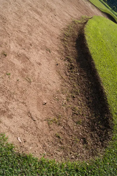 Campo de golf de arena agujero — Foto de Stock