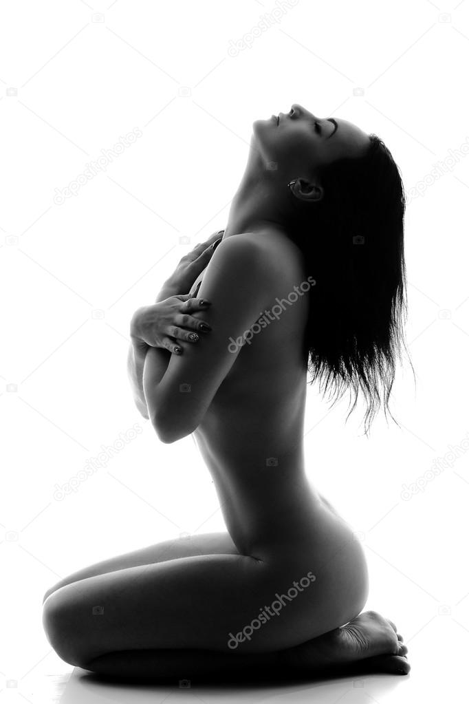 Woman's naked body in silhouette
