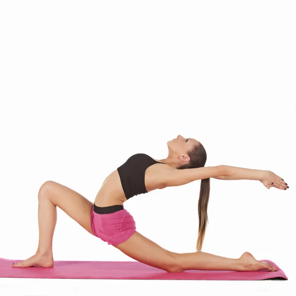 Mooi meisje yoga poseren — Stockfoto