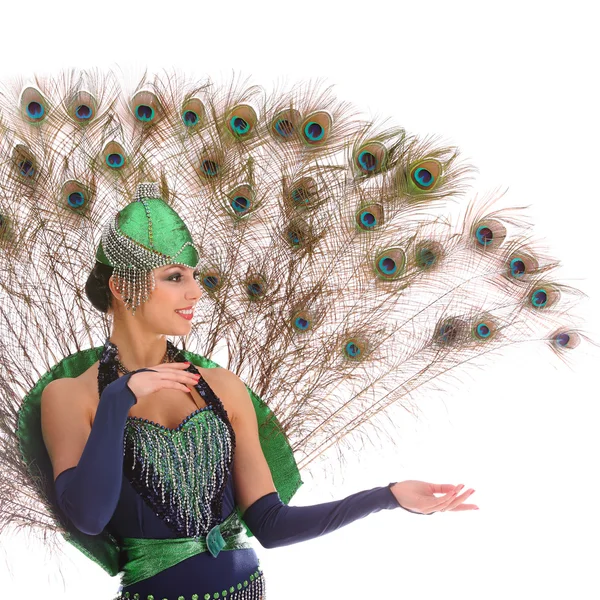 Burlesque dancer with peacock feathers and green dress — Stock Photo, Image