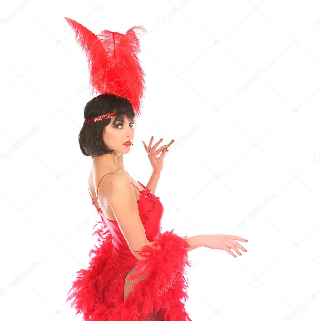 Burlesque dancer with red plumage and short dress, isolated on white