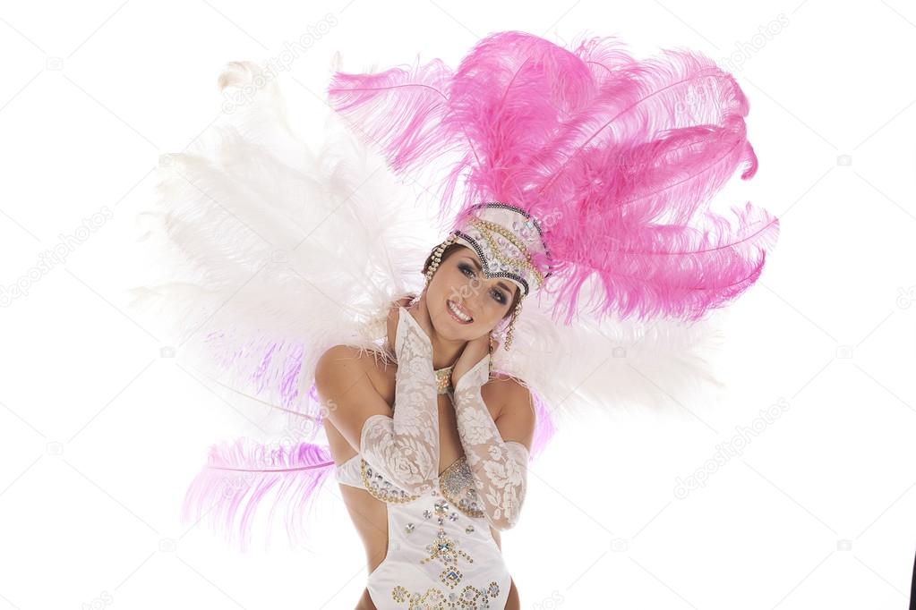 Burlesque dancer in white dress with pink plumage