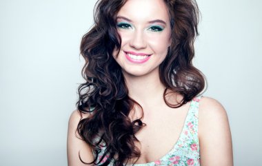 Beauty portrait of smiling young woman.