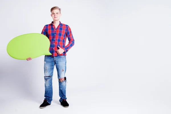 Handsome man holding empty board — Stock Photo, Image