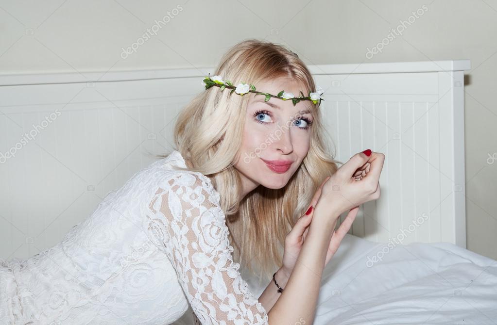 Delicate blonde woman posing. — Stock Photo © NeonShot 50132177