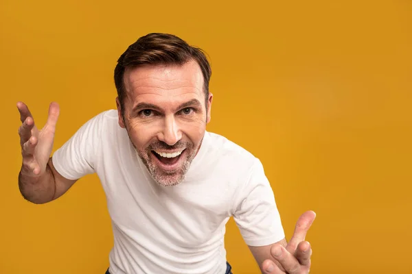Funny Handsome Man Crazy Facial Expression Standing Front Camera Yellow — Stock Photo, Image