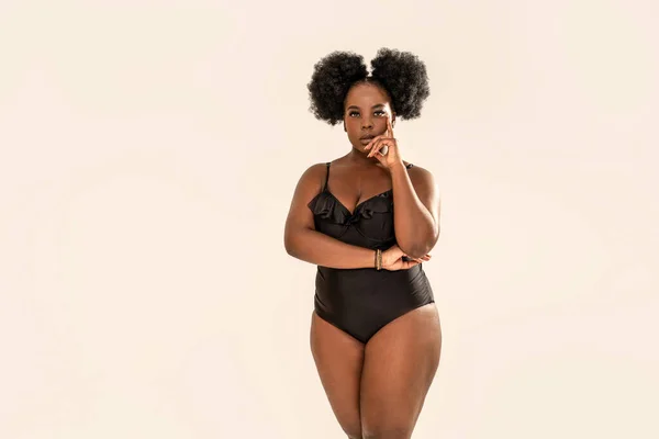 Seductive African Woman Black Fashionable Swimsuit Posing Looking Camera Gray —  Fotos de Stock