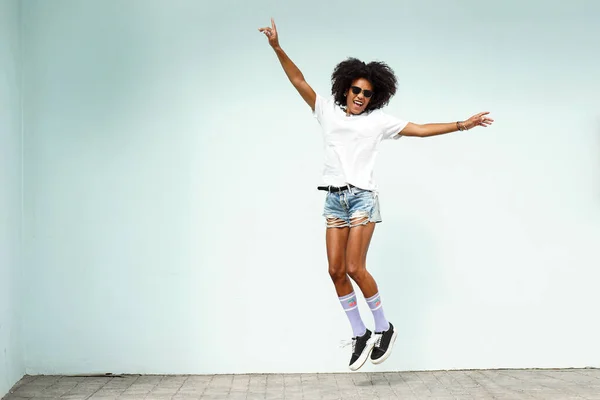 Happy Young Hipster Woman Afro Hairstyle Fashionable Clothes Jumping Big —  Fotos de Stock