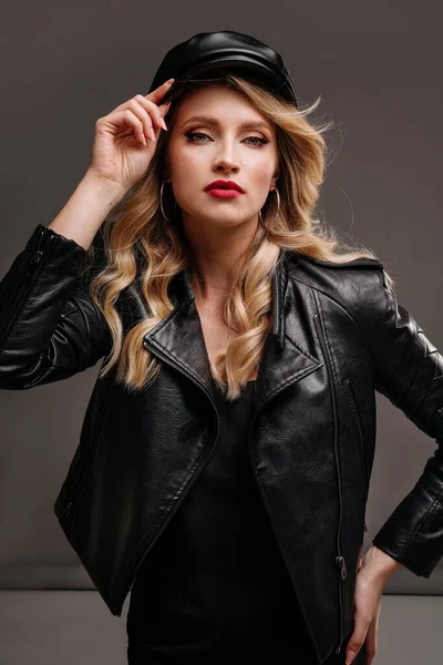 Fashionable Young Blonde Woman Wearing Leather Black Jacket Cap Looking — Stockfoto